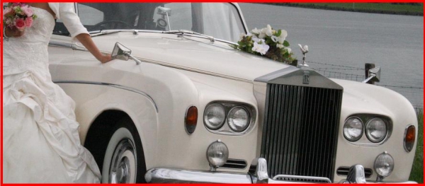 TROUWAUTO WITTE ROLLS-ROYCE SILVER CLOUD TE HUUR TROUWVERVOER HUREN VERHUUR
